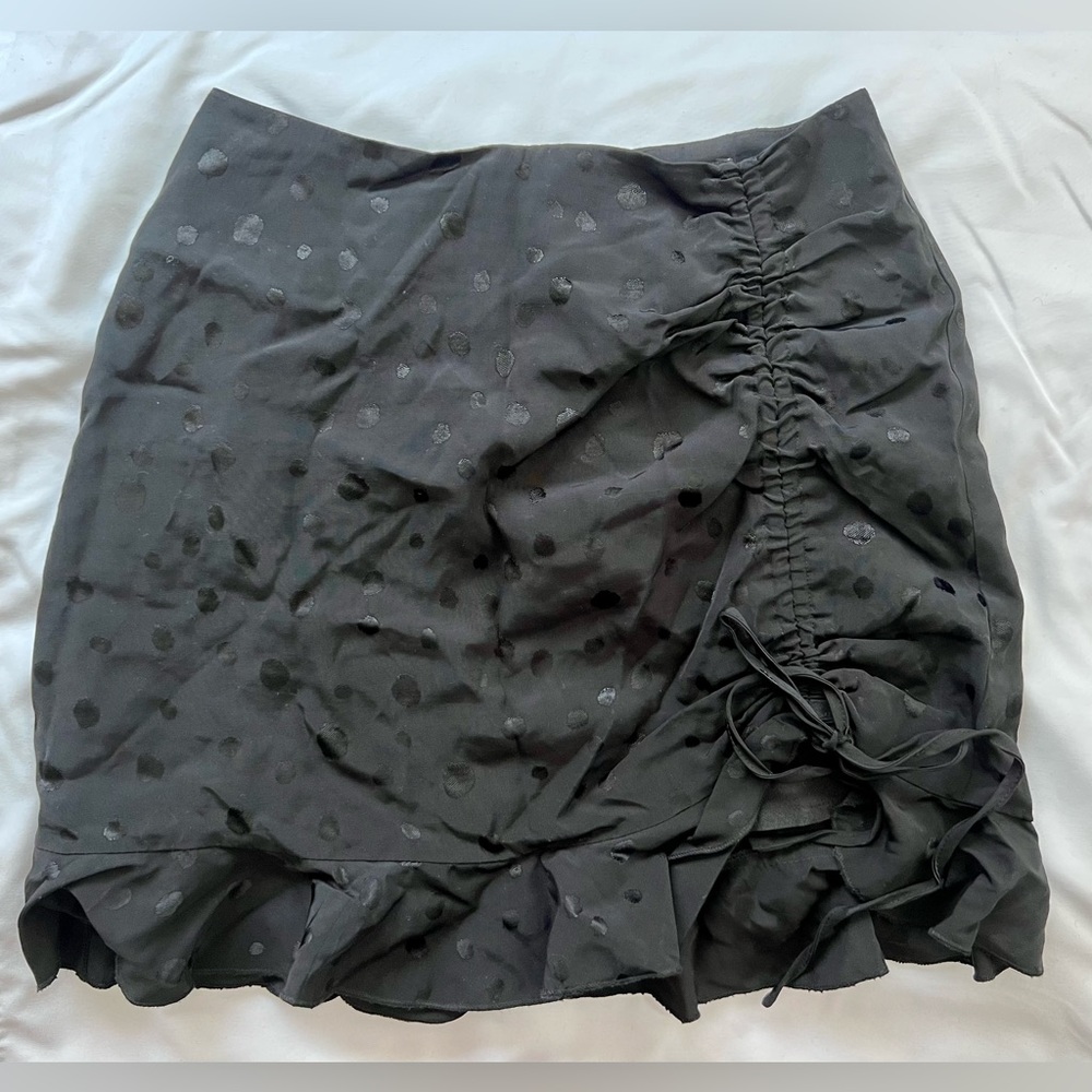 Satin Black ruffled mini skirt size XS like new condition.